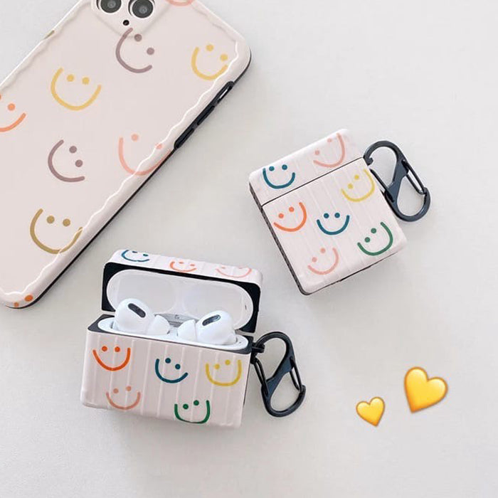 smiley faces airpods case boogzel apparel