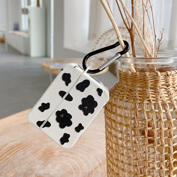 cow print airpods case boogzel apparel
