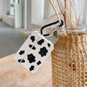 cow print airpods case boogzel apparel