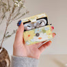 yellow floral print airpods case boogzel apparel